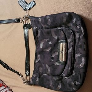 Black and silver Coach purse